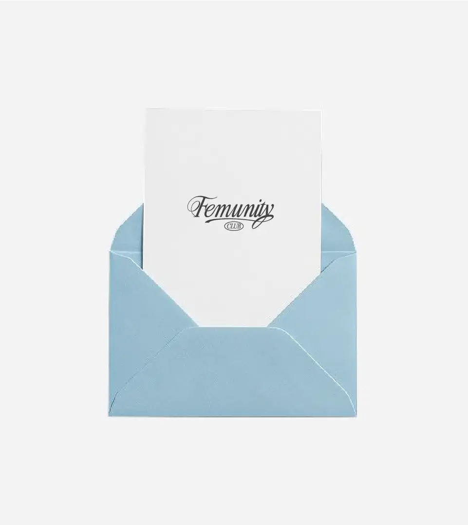 Light blue envelope with white Femunity Club invitation postcard emerging, dark logo on card, elegant cream background composition